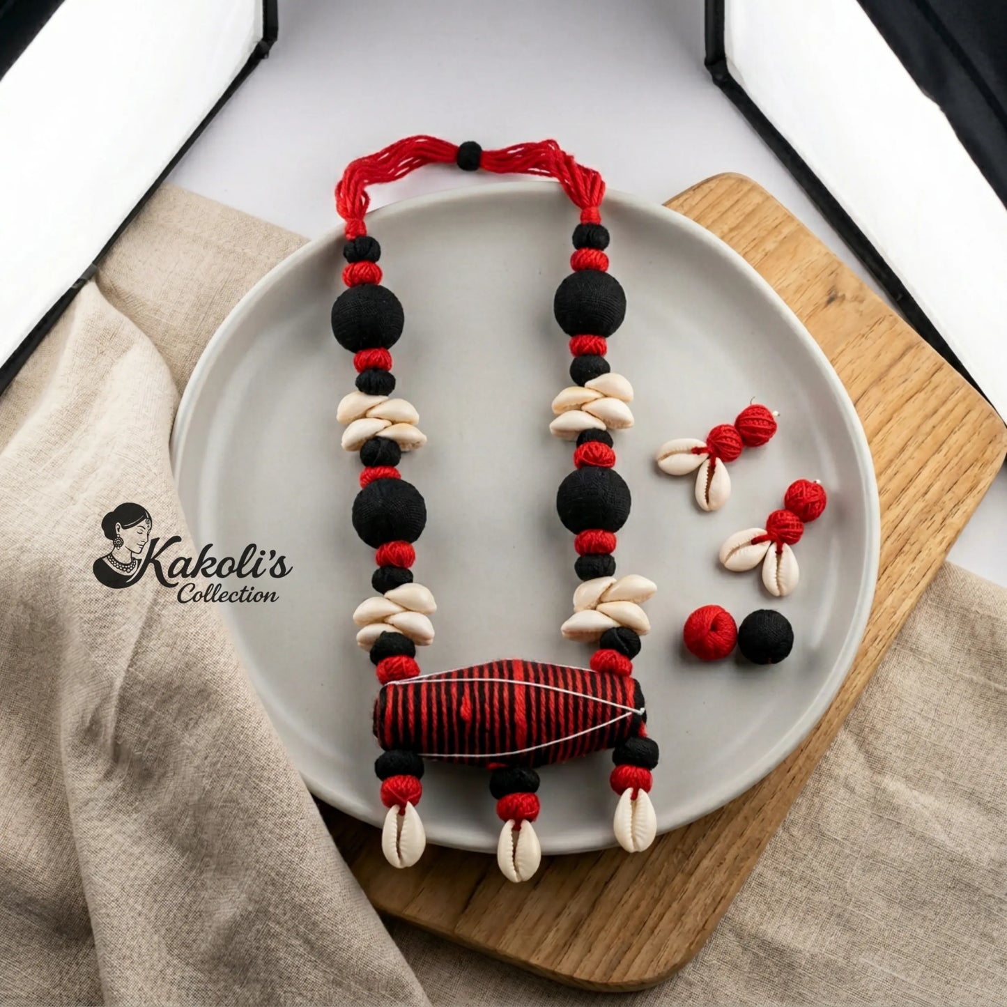 Scarlet Harmony Handcrafted Fabric Dhol & Cowrie Jewelry Set